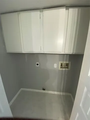 a view of a floor to ceiling window and an outdoor view