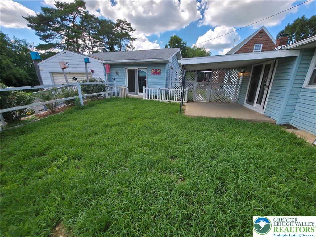 719 Keystone Avenue Bethlehem, PA 18018 - Photo 30 of 32 A generous lawn and inviting patio area provide ample space for outdoor living.
