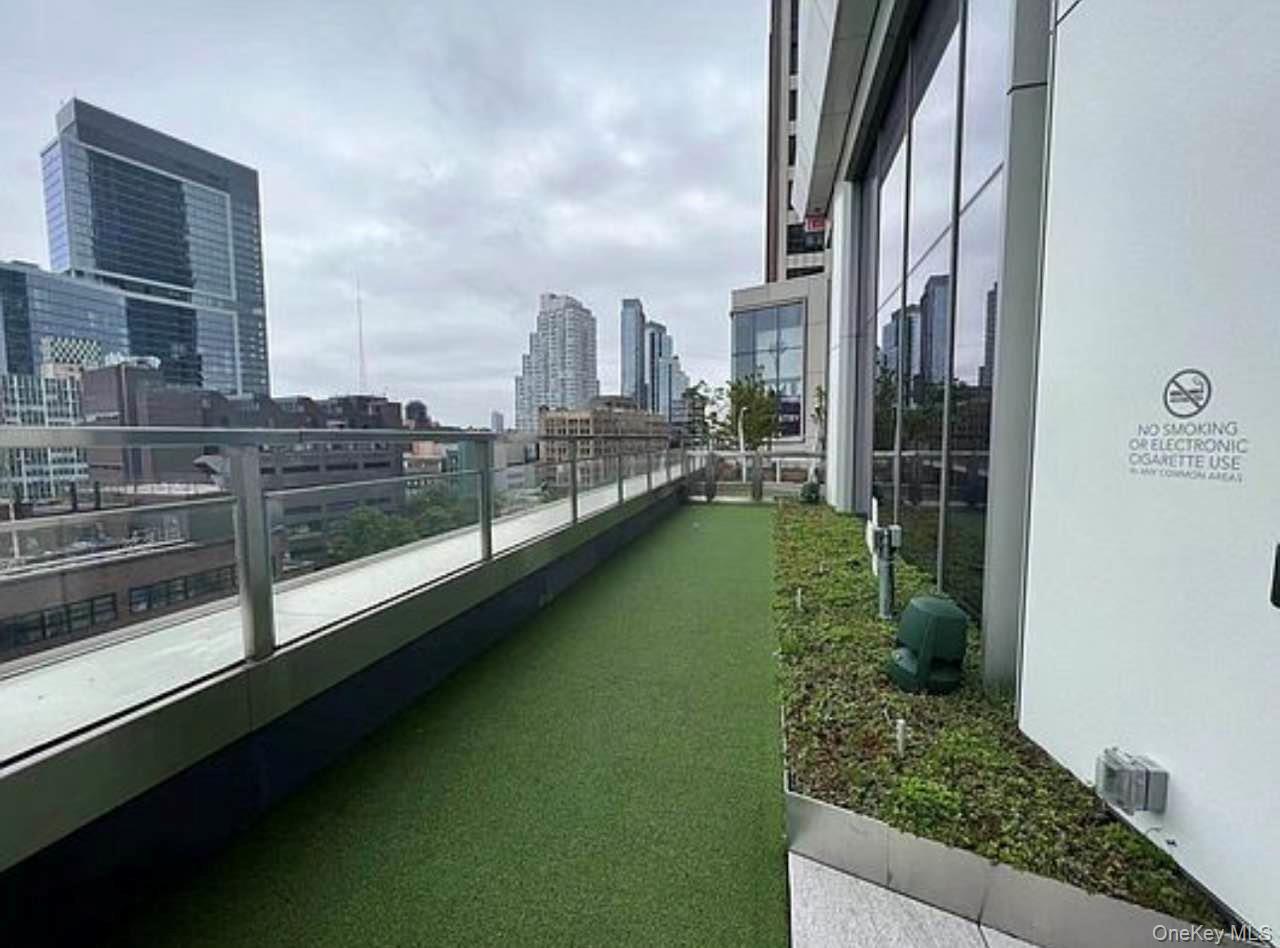 131-03 40 Road, Unit 18E Queens, NY 11354 - Photo 12 of 33 a view of a balcony