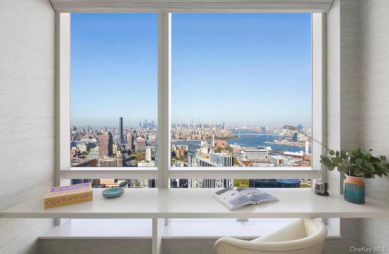 131-03 40 Road, Unit 18E Queens, NY 11354 - Photo 4 of 33 a room with furniture and a window