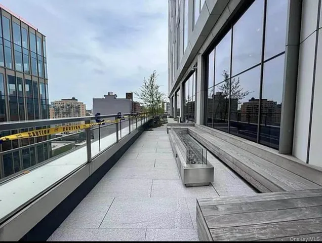 a view of a balcony with city view