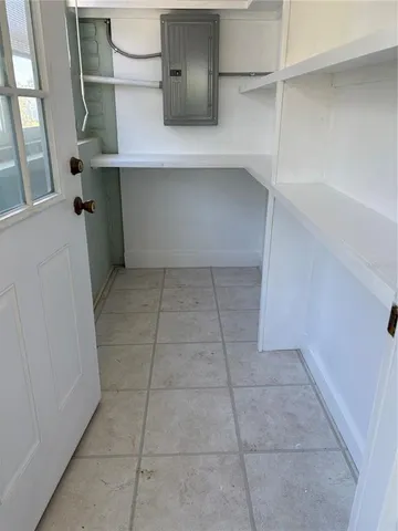 a hallway with cabinets