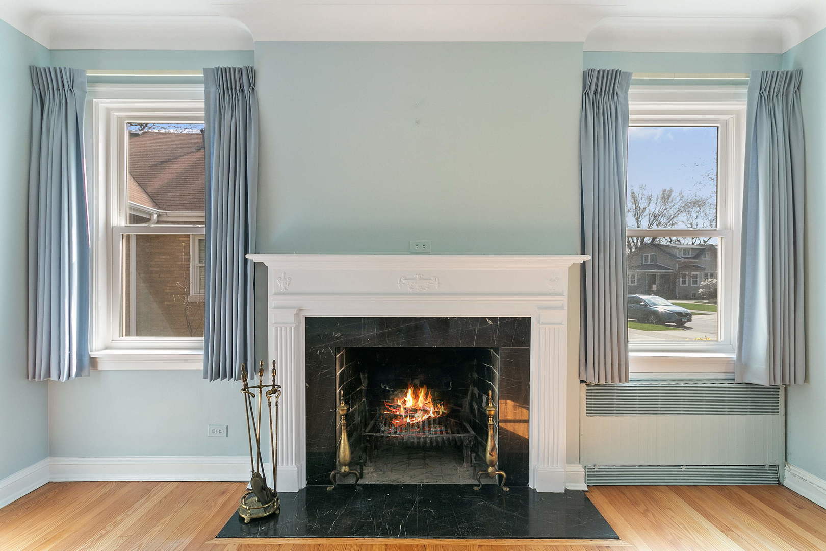 294 Shenstone Road Riverside, IL 60546 - Photo 4 of 29 a living room with furniture and a fireplace