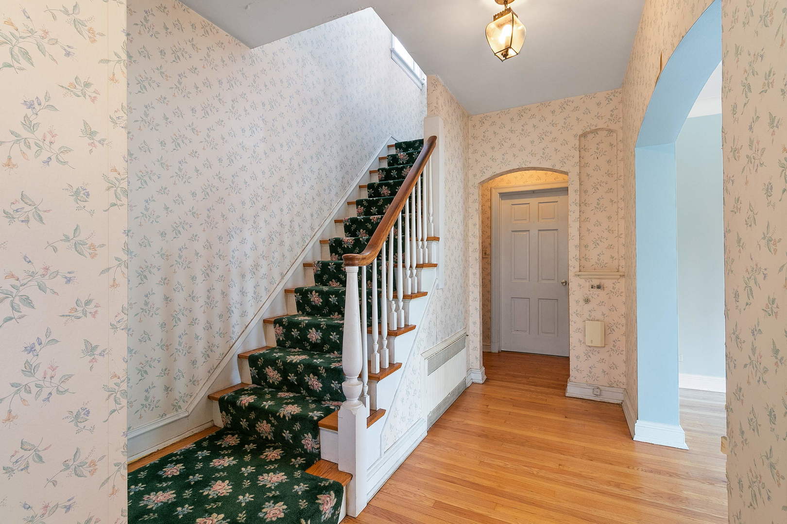 294 Shenstone Road Riverside, IL 60546 - Photo 5 of 29 a view of a hallway with wooden floor and entryway