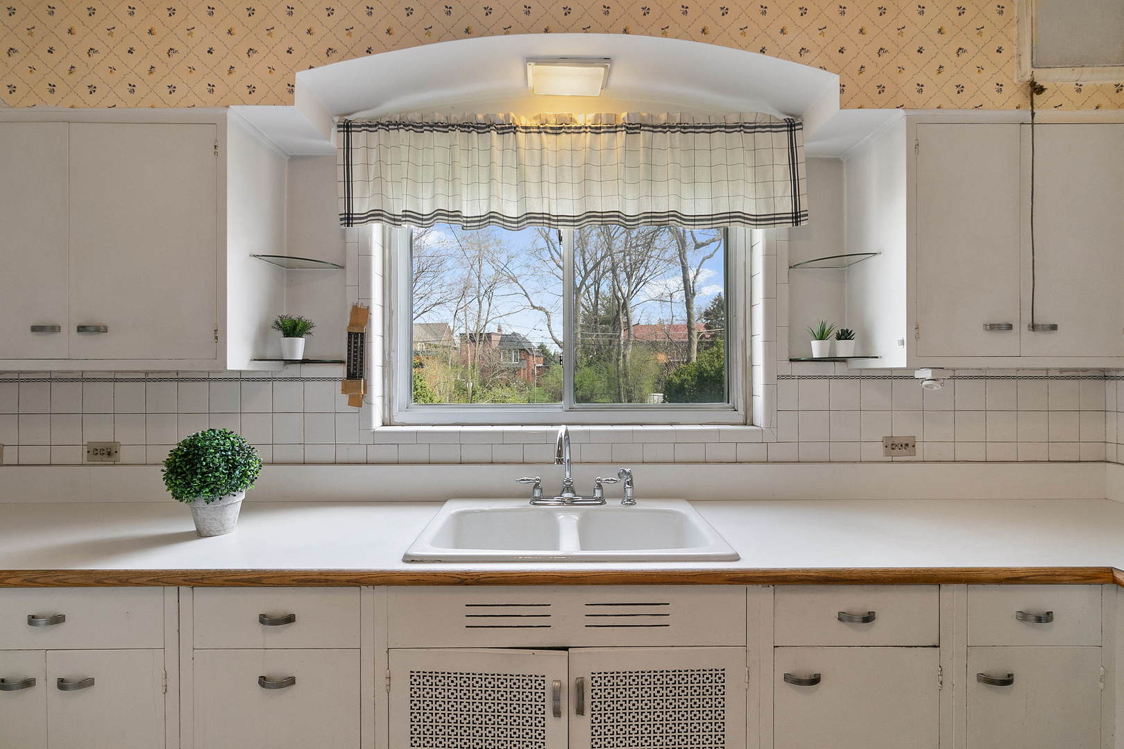 294 Shenstone Road Riverside, IL 60546 - Photo 7 of 29 a kitchen with a sink and a window