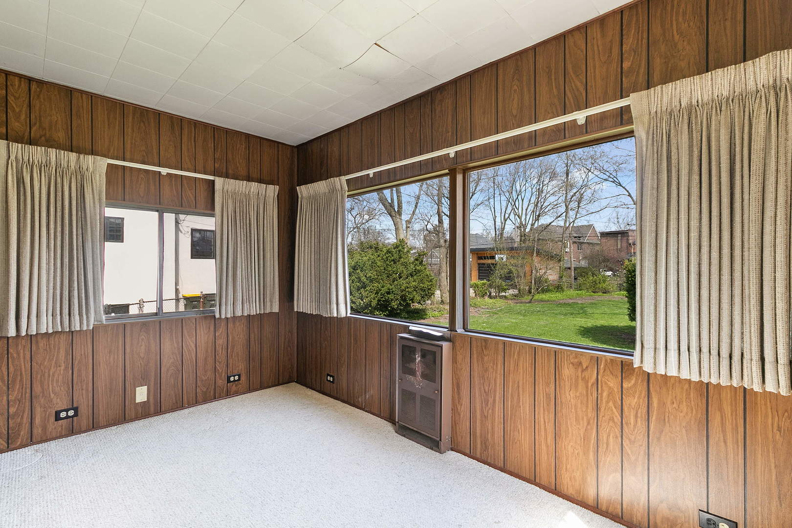 294 Shenstone Road Riverside, IL 60546 - Photo 10 of 29 a view of an empty room with wooden floor and a window