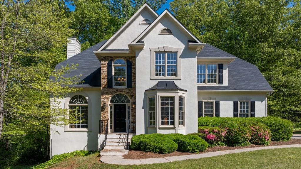 1820 Lyon Avenue Atlanta, GA 30331 - Photo 1 of 1 a front view of a house with a yard
