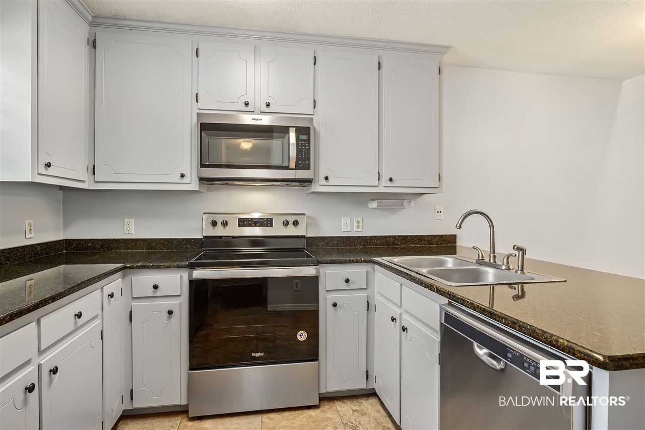 200 Parma Drive, Unit N1 Daphne, AL 36526 - Photo 7 of 24 Granite Counters & tons of storage