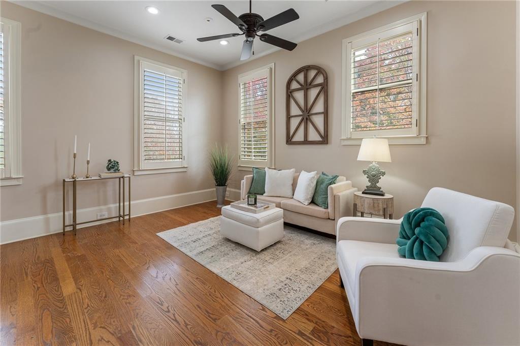 1950 Heritage Walk Alpharetta, GA 30004 - Photo 32 of 64 a living room with furniture and a large window