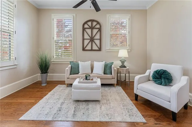 a bedroom with bed and a chandelier