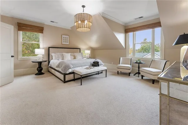 a bathroom with a tub sink and window