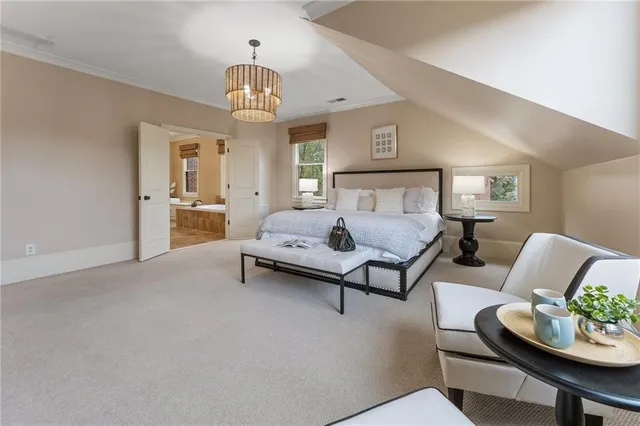 a bathroom with a sink a mirror and a shower