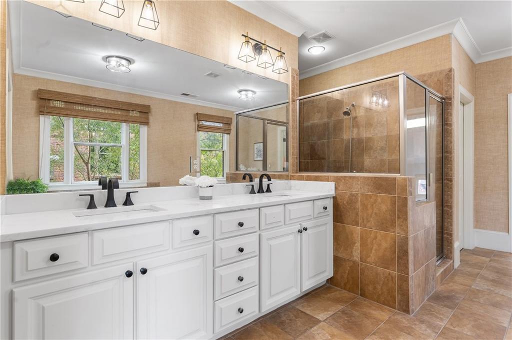 1950 Heritage Walk Alpharetta, GA 30004 - Photo 44 of 64 a bathroom with a granite countertop sink mirror and double