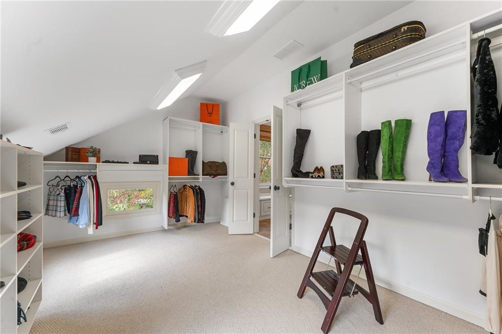 1950 Heritage Walk Alpharetta, GA 30004 - Photo 48 of 64 a view of a room with gym equipment