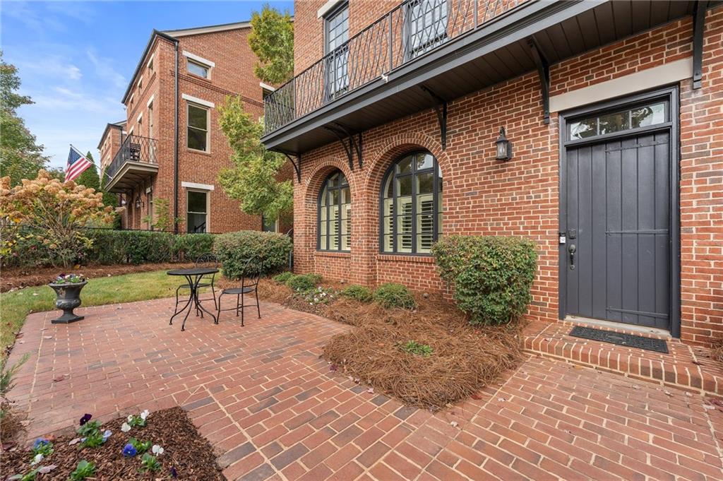 1950 Heritage Walk Alpharetta, GA 30004 - Photo 5 of 64 a view of house with yard and outdoor seating