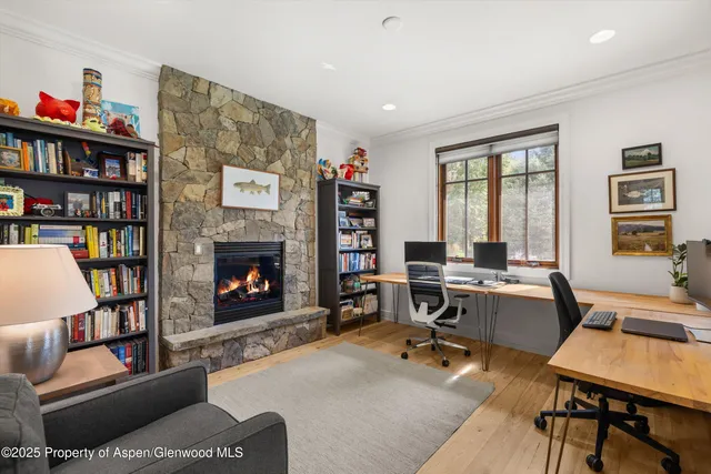 a bedroom with a bed and a chair