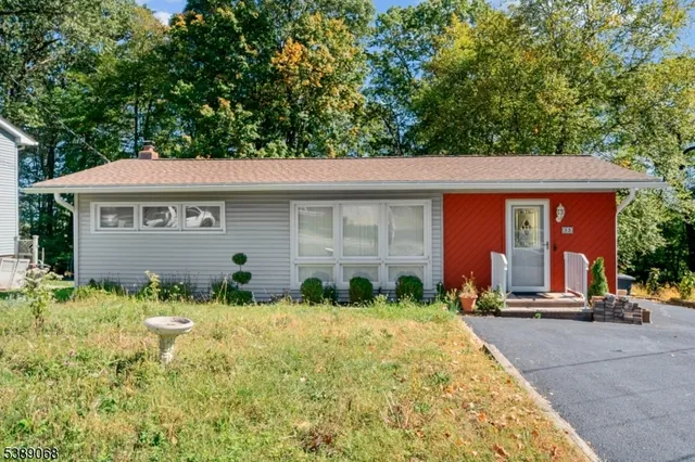 front view of house with a yard