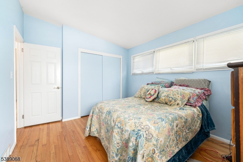 53 White Meadow Road Rockaway, NJ 07866 - Photo 13 of 40 a bedroom with a bed and a window