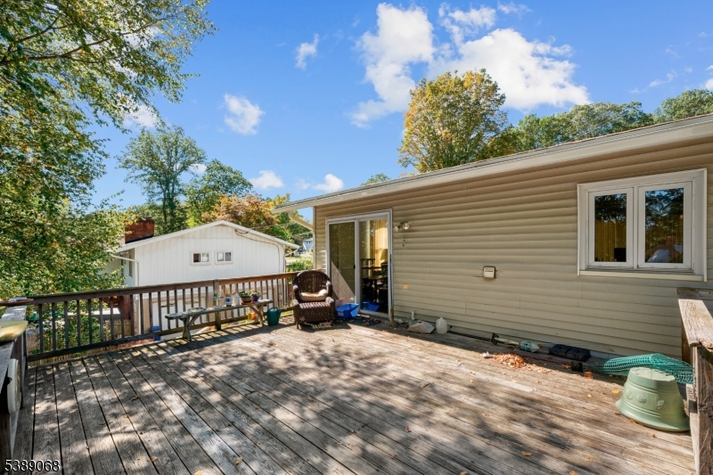 53 White Meadow Road Rockaway, NJ 07866 - Photo 19 of 40 a view of a house with a yard