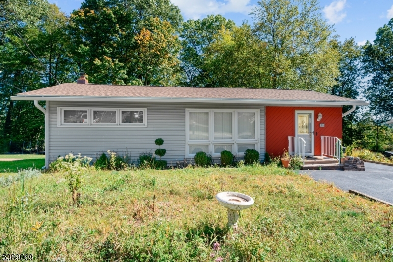 53 White Meadow Road Rockaway, NJ 07866 - Photo 2 of 40 front view of house with a yard