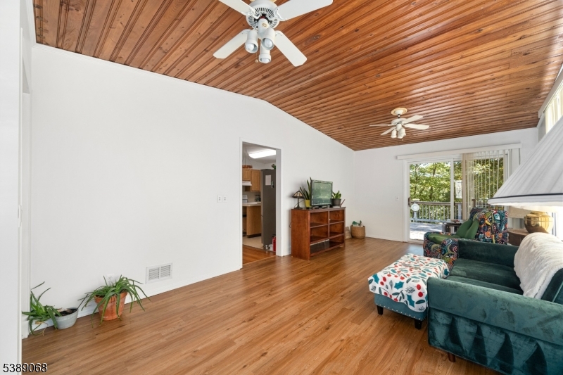 53 White Meadow Road Rockaway, NJ 07866 - Photo 5 of 40 a living room with furniture and wooden floor