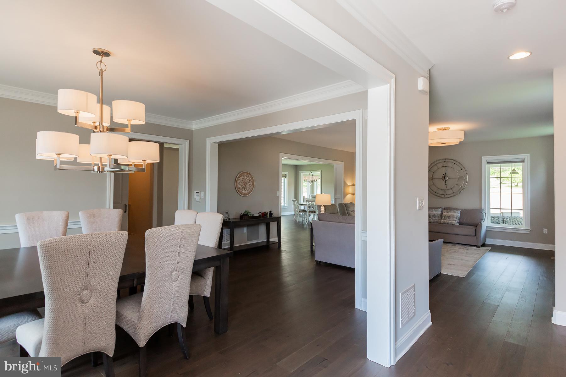 425 East Delp Road Lancaster, PA 17601 - Photo 17 of 109 a view of a dining room with furniture wooden floor and chandelier