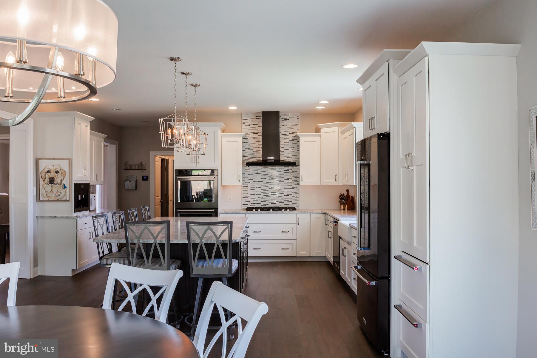 425 East Delp Road Lancaster, PA 17601 - Photo 32 of 109 a kitchen with refrigerator and cabinets