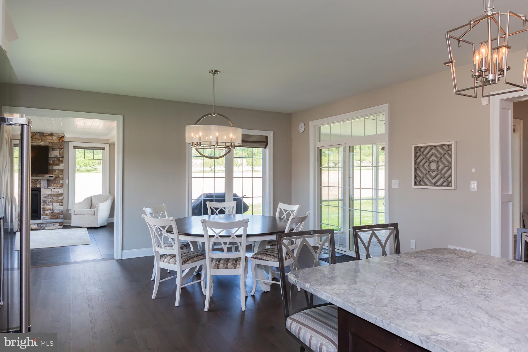 425 East Delp Road Lancaster, PA 17601 - Photo 44 of 109 a view of a dining room with furniture window and wooden floor