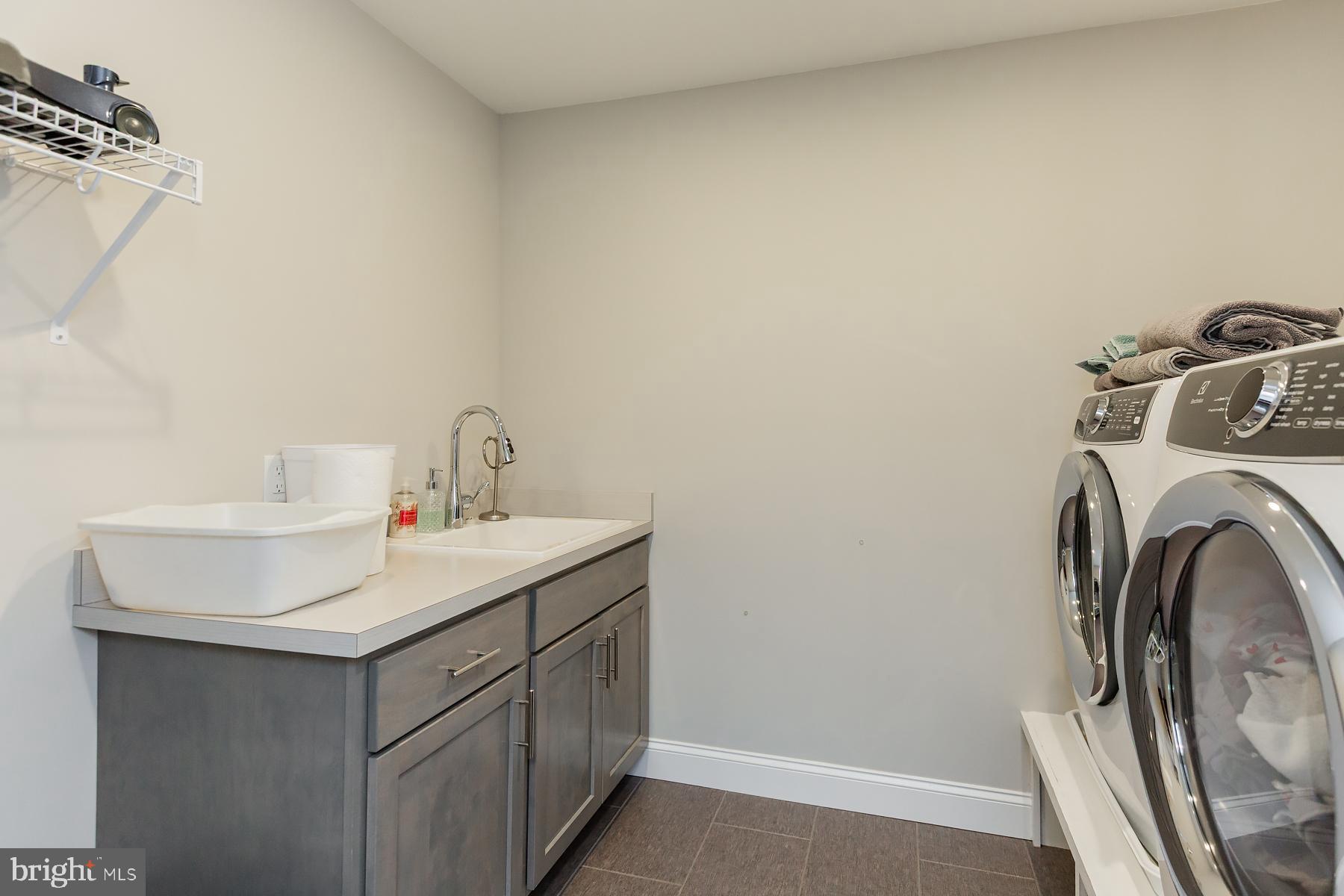 425 East Delp Road Lancaster, PA 17601 - Photo 68 of 109 a utility room with sink dryer and washer