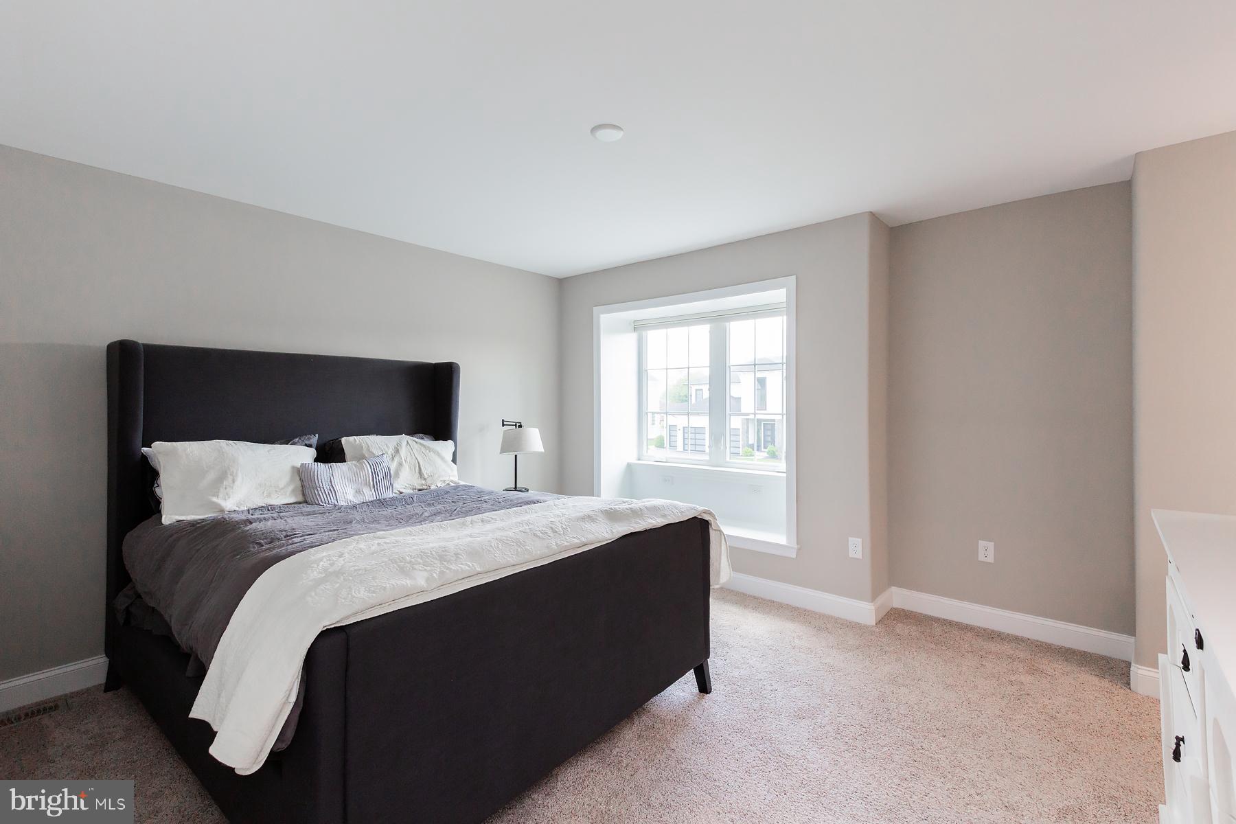 425 East Delp Road Lancaster, PA 17601 - Photo 69 of 109 a bedroom with a bed and a window