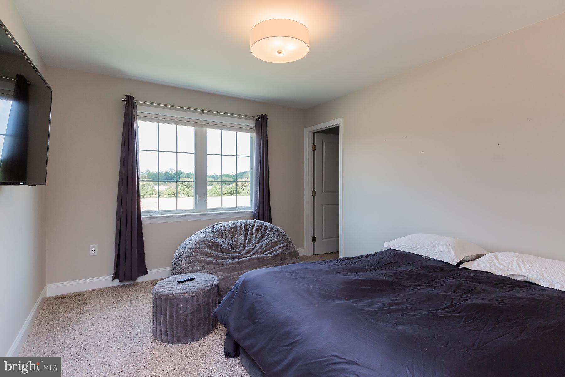 425 East Delp Road Lancaster, PA 17601 - Photo 72 of 109 a bedroom with a bed and a window