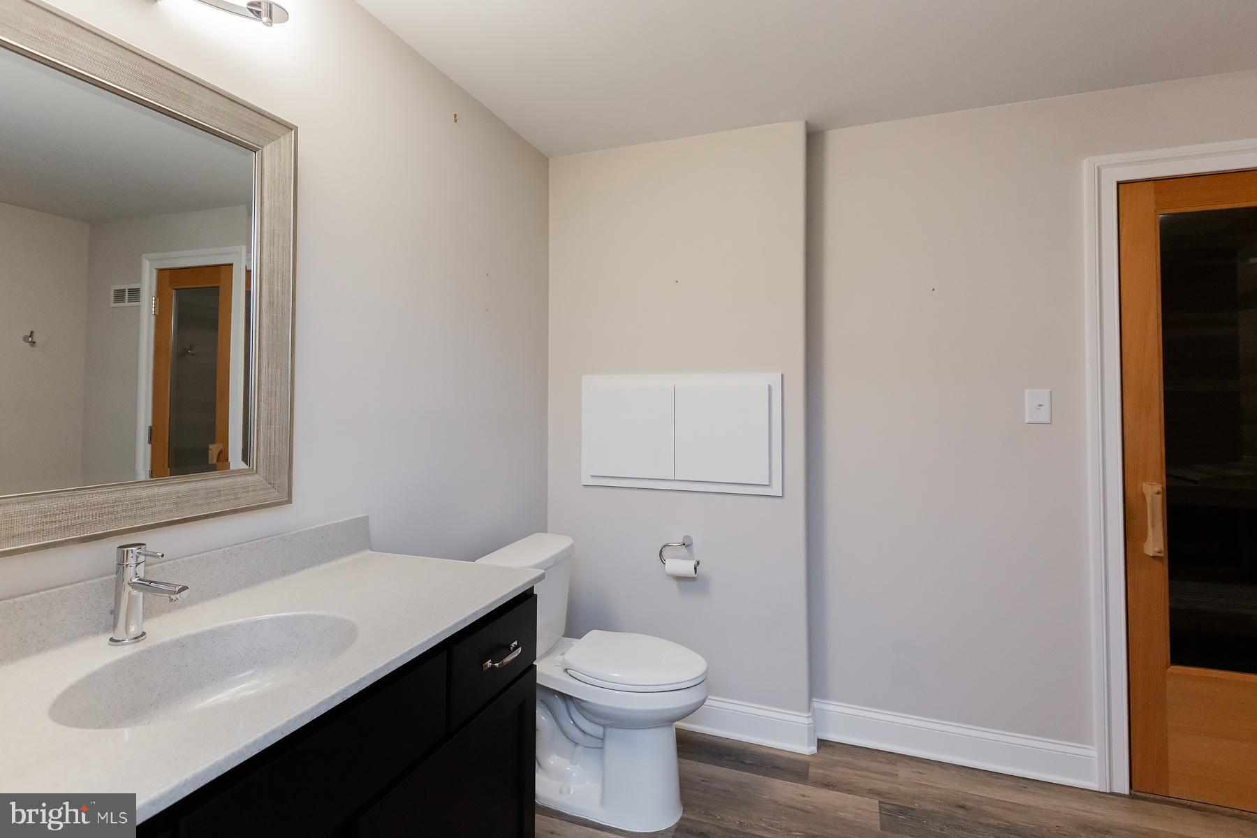 425 East Delp Road Lancaster, PA 17601 - Photo 92 of 109 a bathroom with a sink toilet and vanity