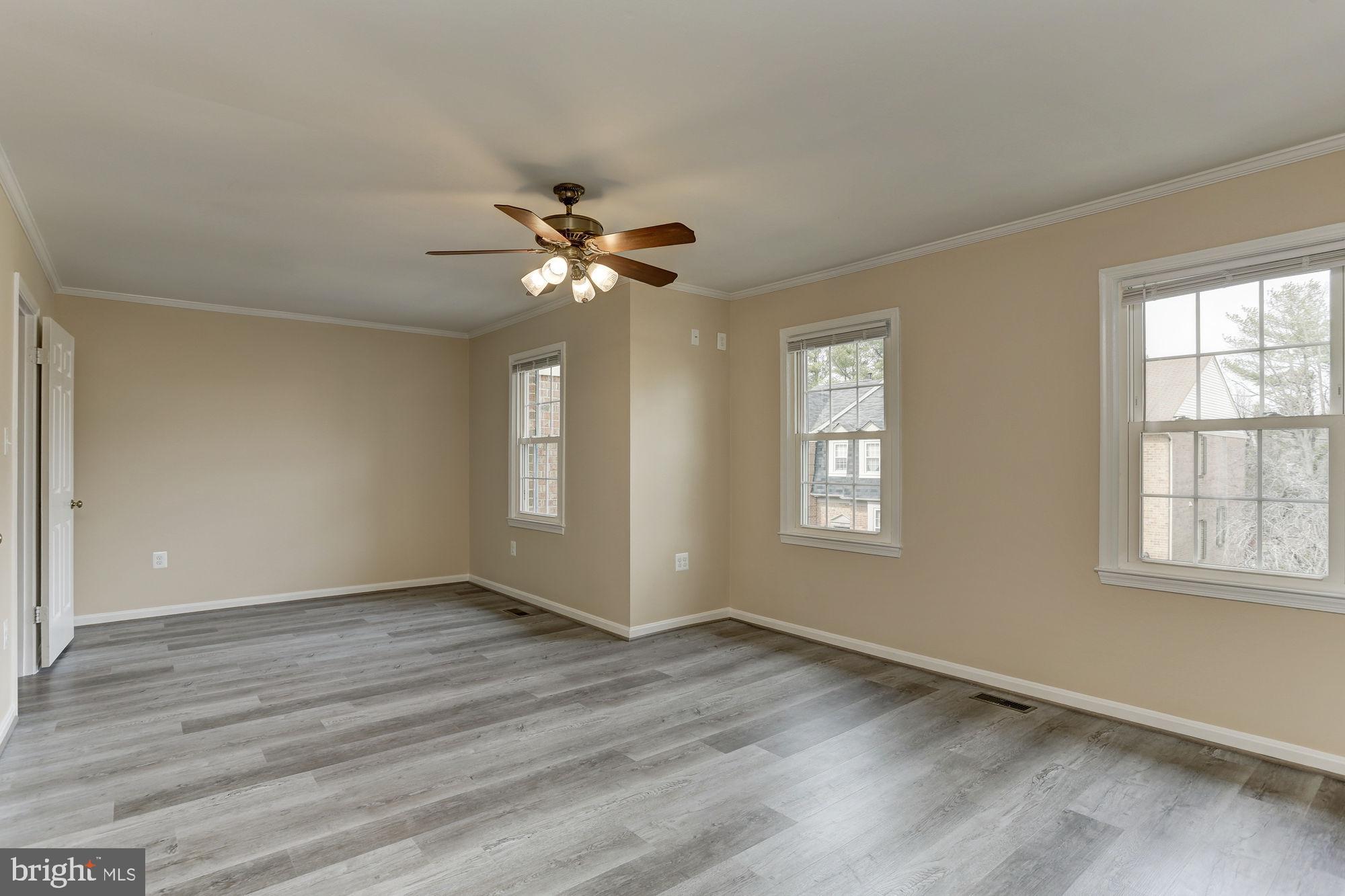 10107 Galsworthy Place Bethesda, MD 20817 - Photo 28 of 62 a view of an empty room with a window