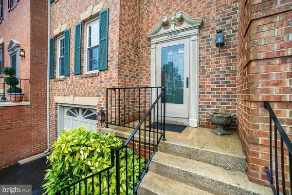 a view of a chair and table in the patio