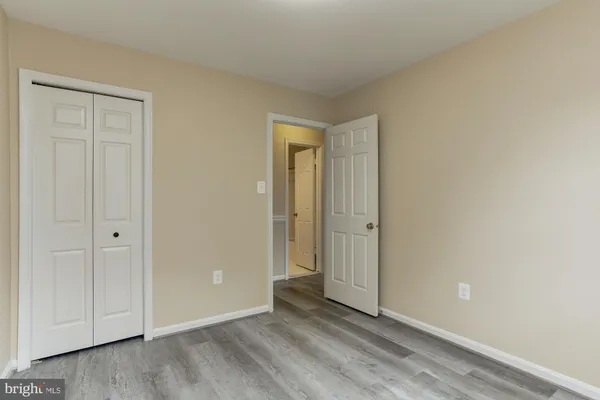 a bathroom with a bath tub with a shower