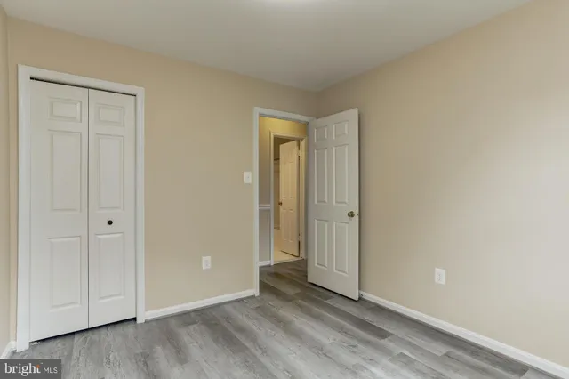 a bathroom with a bath tub with a shower