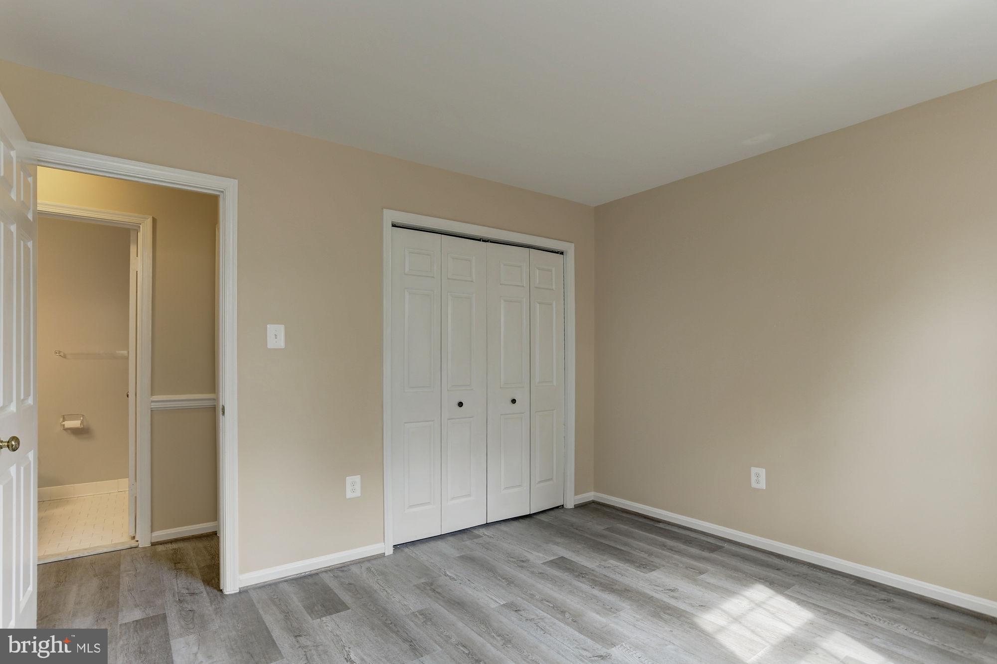 10107 Galsworthy Place Bethesda, MD 20817 - Photo 39 of 62 wooden floor in an empty room