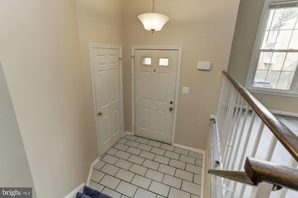 a view of a bathroom with a sink and a mirror