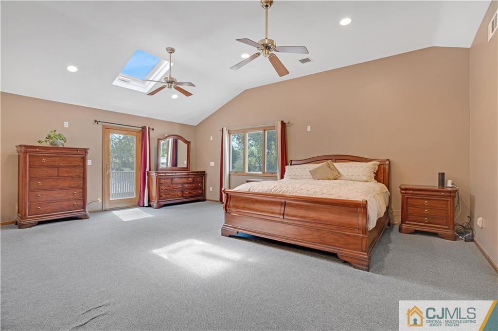 10 Crescent Road Edison, NJ 08817 - Photo 16 of 33 a bed room with a bed and dresser
