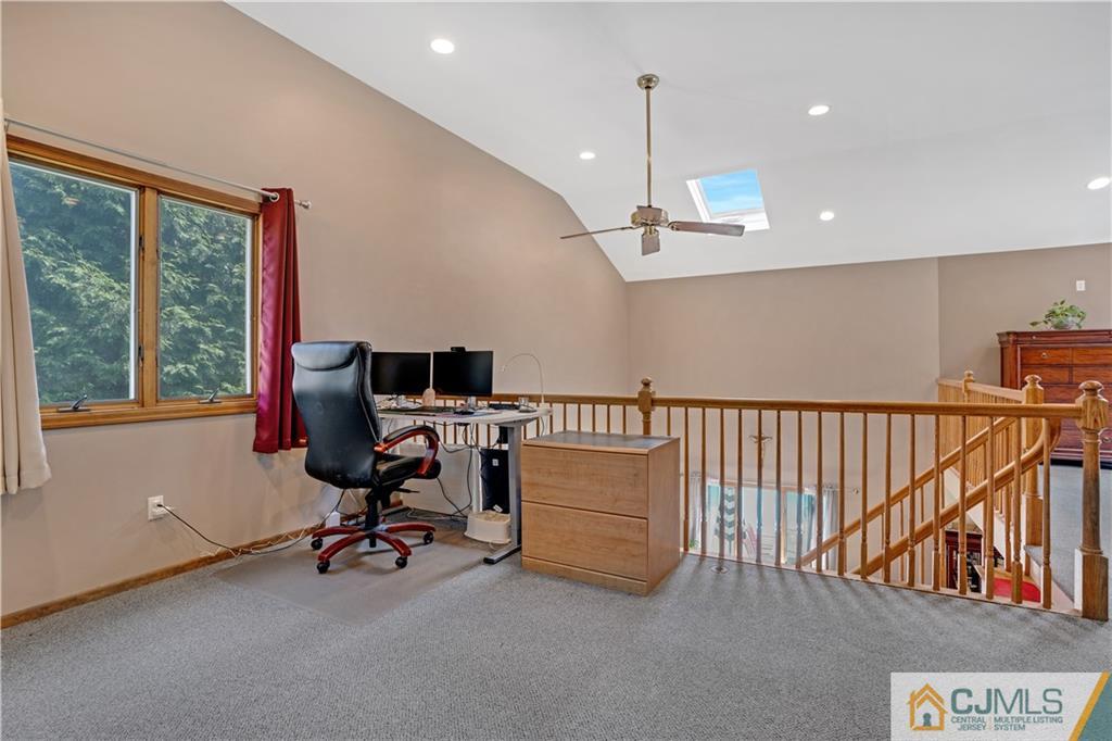 10 Crescent Road Edison, NJ 08817 - Photo 18 of 33 a view of a workspace with furniture and a window