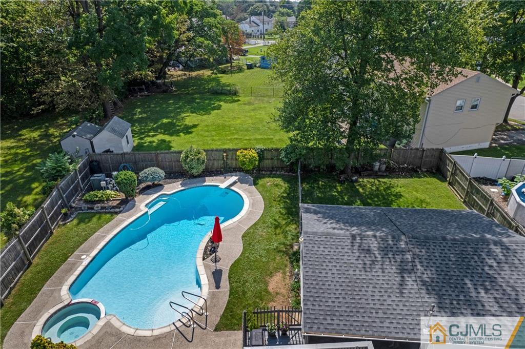 10 Crescent Road Edison, NJ 08817 - Photo 24 of 33 a view of a swimming pool with a yard