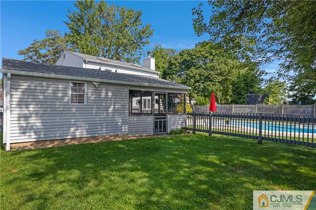 10 Crescent Road Edison, NJ 08817 - Photo 27 of 33 a front view of a house with a garden