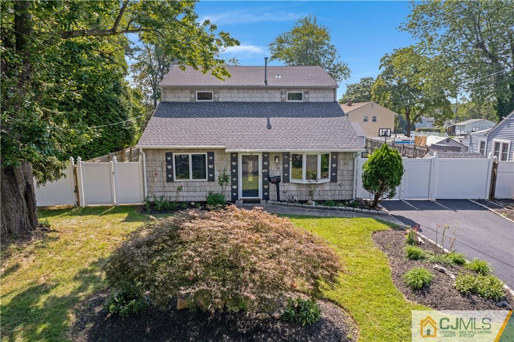 10 Crescent Road Edison, NJ 08817 - Photo 29 of 33 a view of a house with swimming pool and a porch