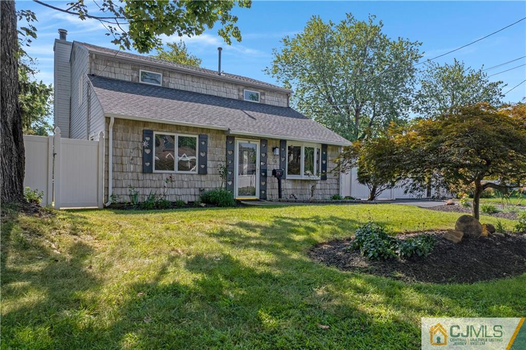 10 Crescent Road Edison, NJ 08817 - Photo 30 of 33 front view of a house with a yard