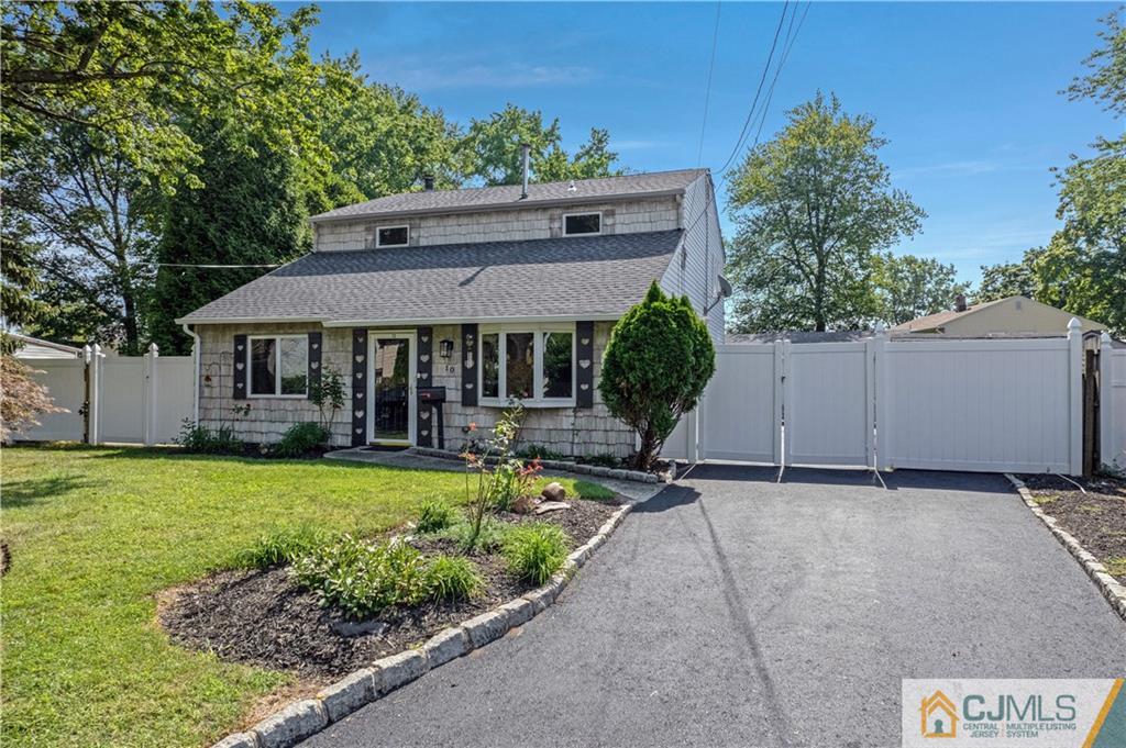 10 Crescent Road Edison, NJ 08817 - Photo 31 of 33 front view of a house with a garden