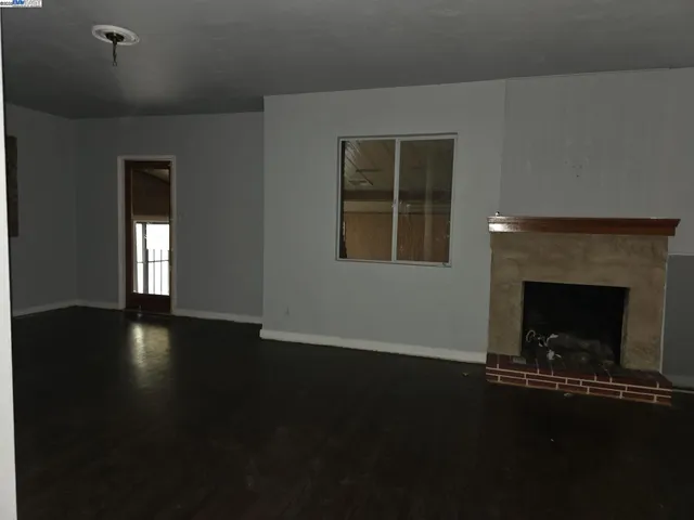 a living room with a fireplace