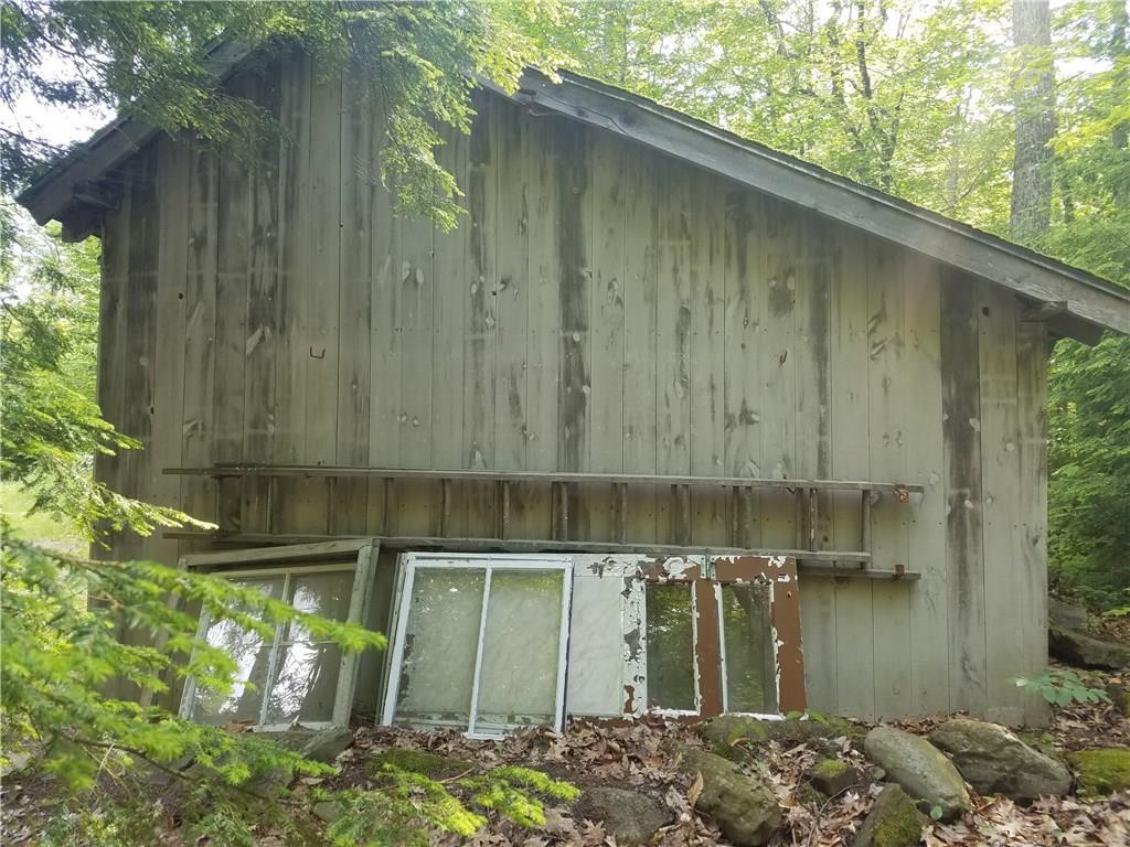 7 Pines Road Searsmont, ME 04973 - Photo 11 of 25 Saltbox style, and the roof looks great.