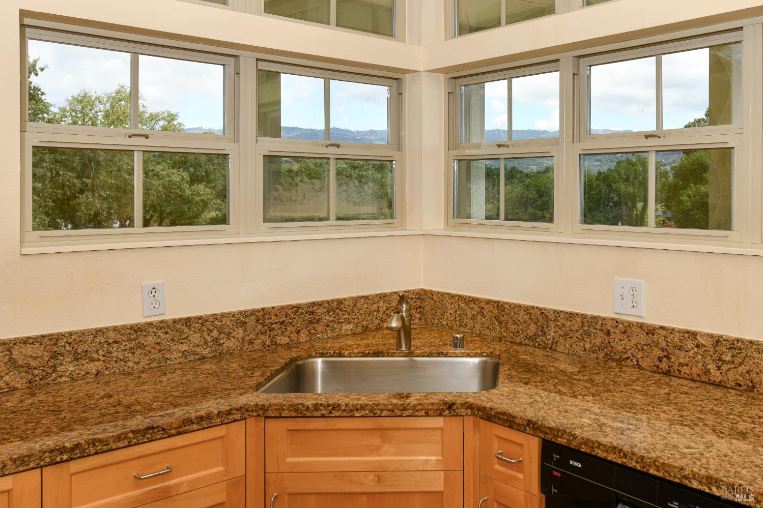 1219 Repetto Ranch Road Sonoma, CA 95476 - Photo 12 of 54 a kitchen with granite countertop a sink and a window