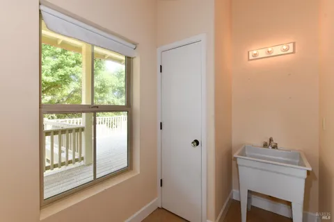 an empty room with closet area
