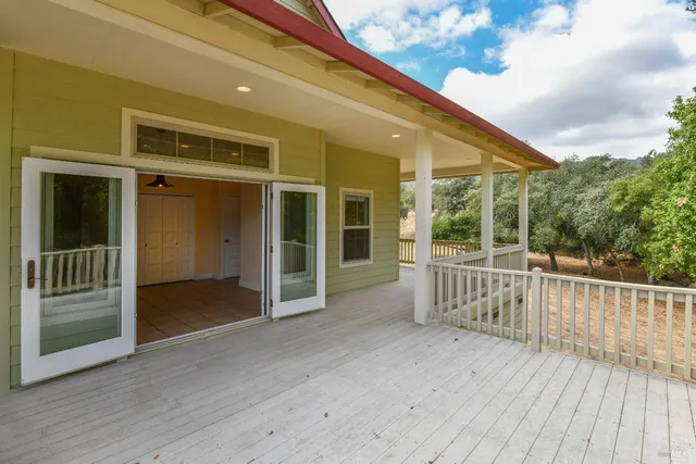 a view of a house with a swimming pool